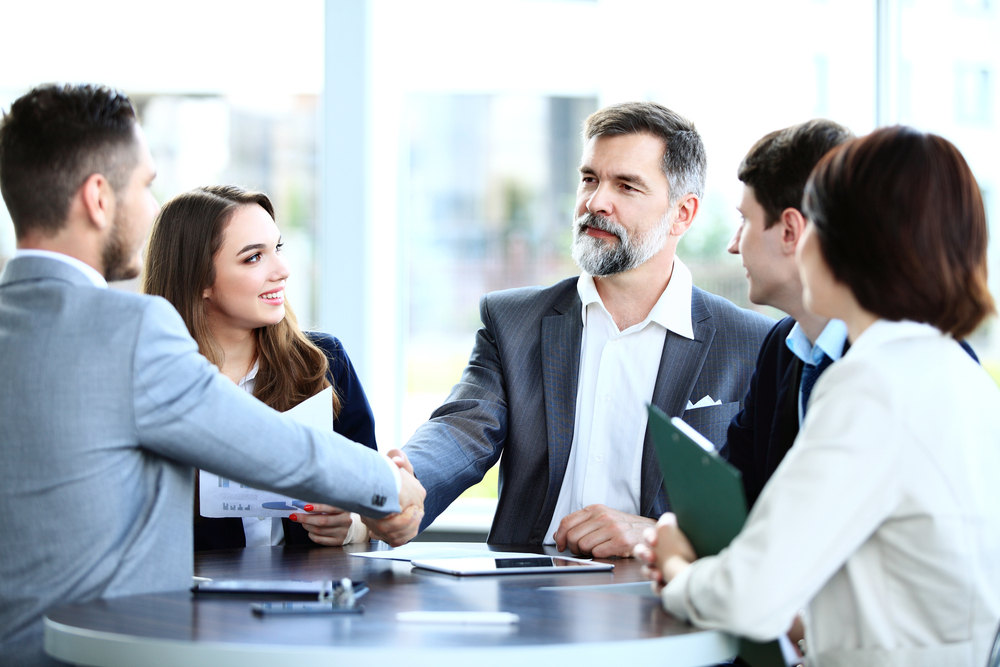 Business professionals investing in content strategy
